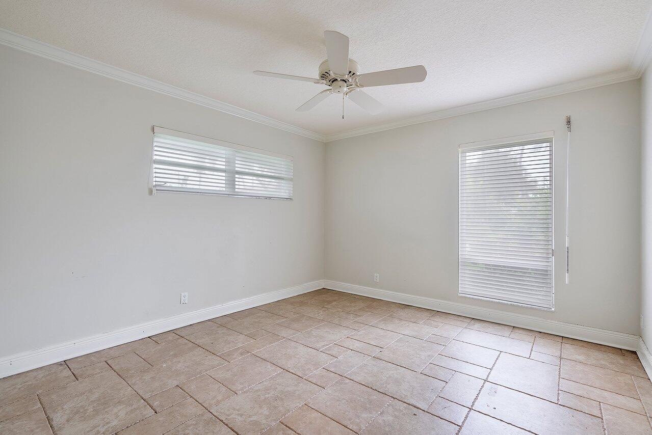 756 Dover Street Boca Raton, FL 33487 - Photo 24 of 29 a view of an empty room with a window