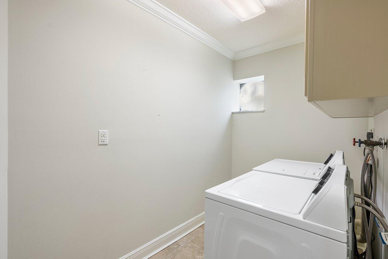 756 Dover Street Boca Raton, FL 33487 - Photo 28 of 29 a utility room with dryer and washer