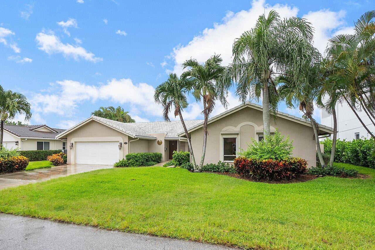 756 Dover Street Boca Raton, FL 33487 - Photo 6 of 29 a front view of house with yard and green space