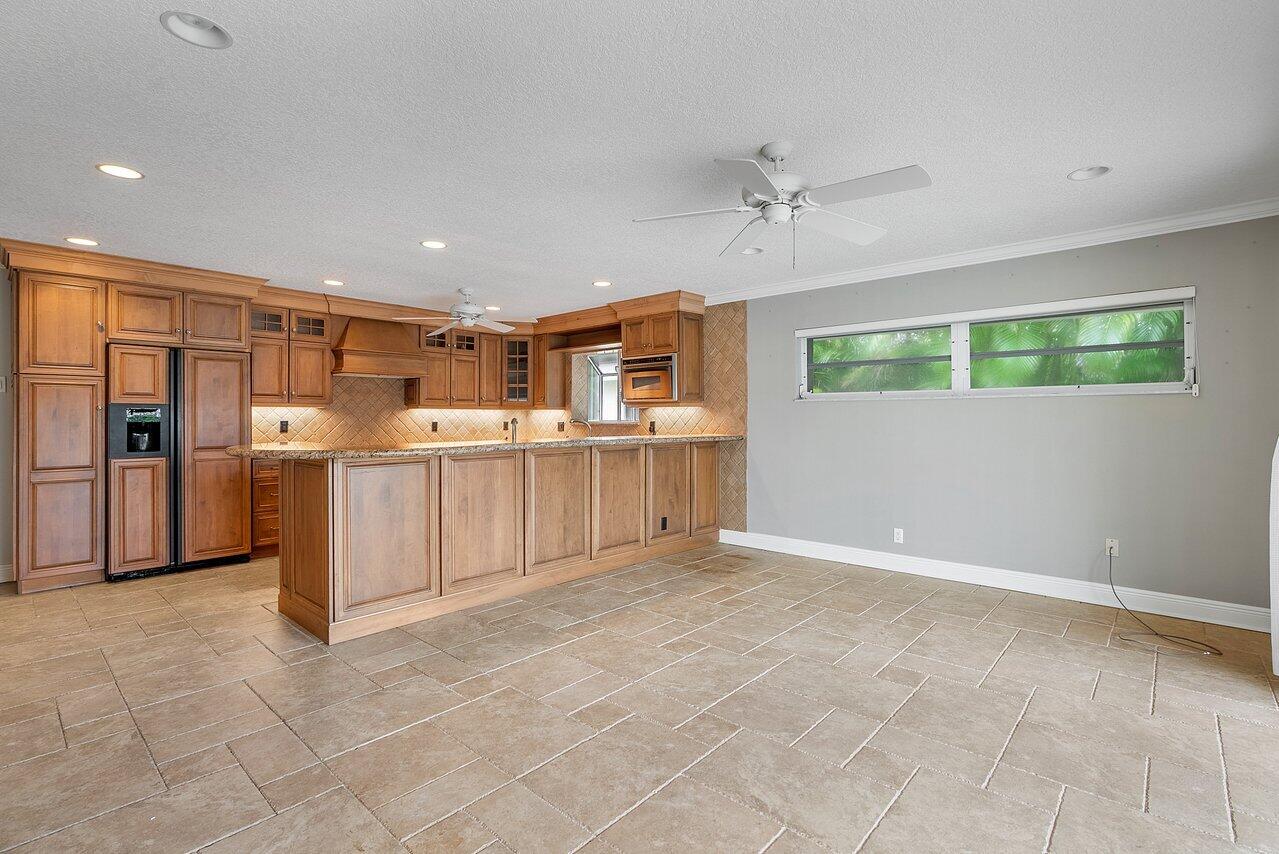 756 Dover Street Boca Raton, FL 33487 - Photo 10 of 29 a view of kitchen with furniture and window