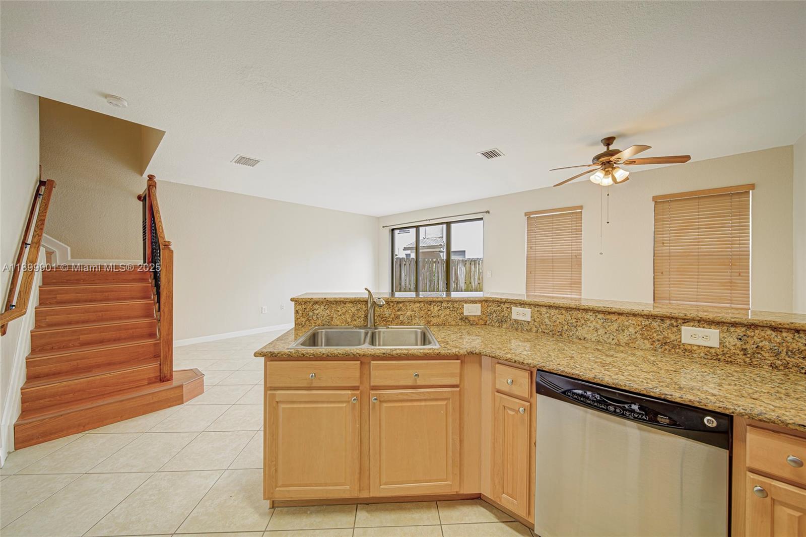 11461 Southwest 236th Lane Homestead, FL 33032 - Photo 12 of 22 a bathroom with a sink vanity granite and a mirror