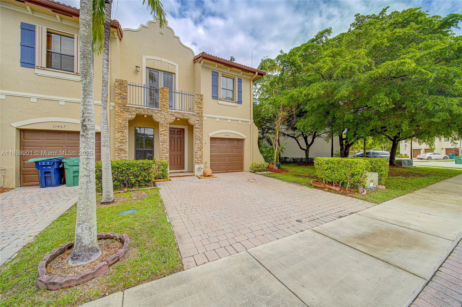 11461 Southwest 236th Lane Homestead, FL 33032 - Photo 3 of 22 a front view of a house with entertaining space