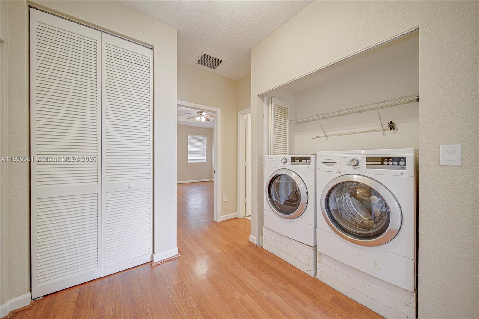 11461 Southwest 236th Lane Homestead, FL 33032 - Photo 10 of 22 a utility room with dryer and washer