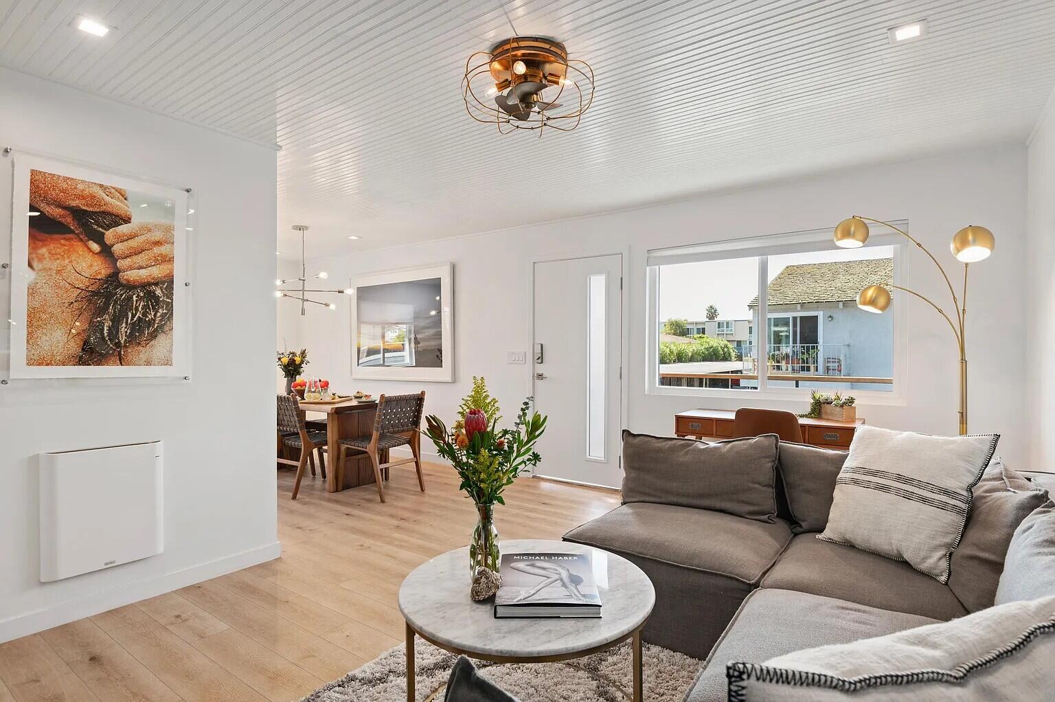 160 Ash Avenue, Unit 3 Carpinteria, CA 93013 - Photo 4 of 11 a living room with furniture flowerpot and wooden floor