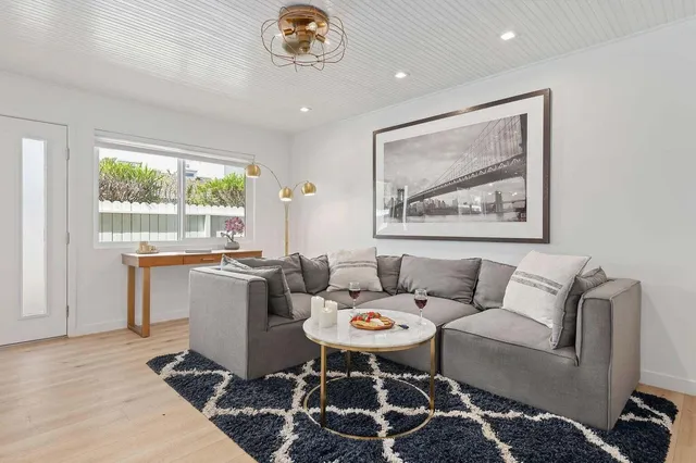 a living room with a couch and a table