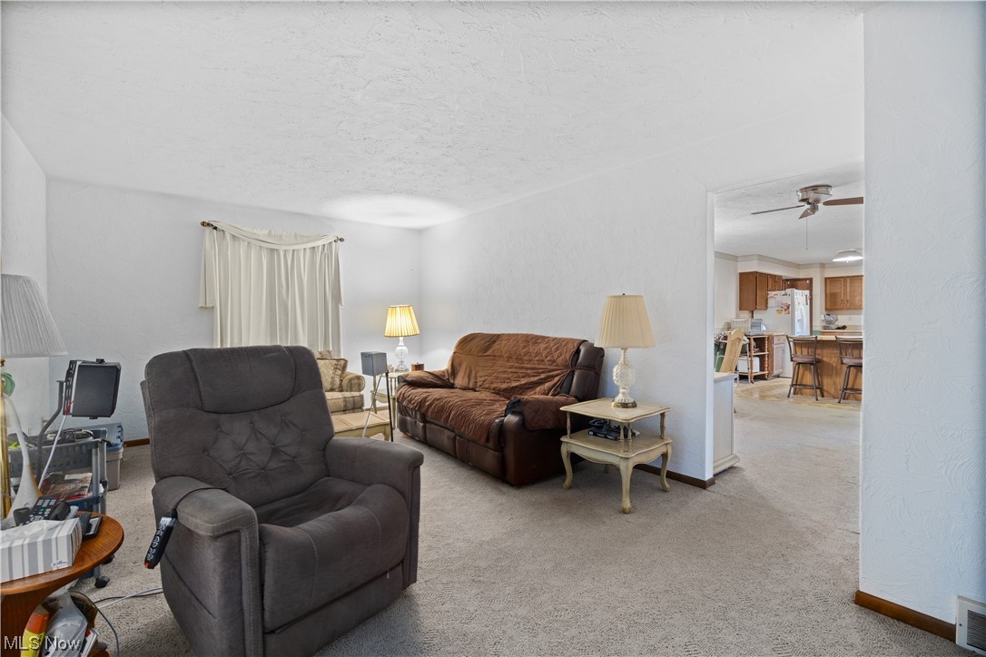 32051 Avon Road Avon, OH 44011 - Photo 13 of 32 Carpeted living room