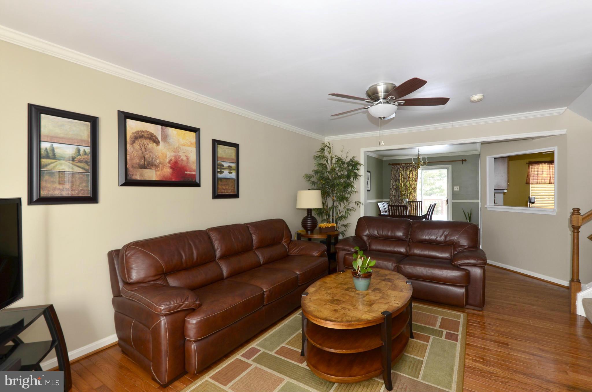 4462 Silver Teal Road Baltimore, MD 21236 - Photo 3 of 30 a living room with furniture and a wooden floor