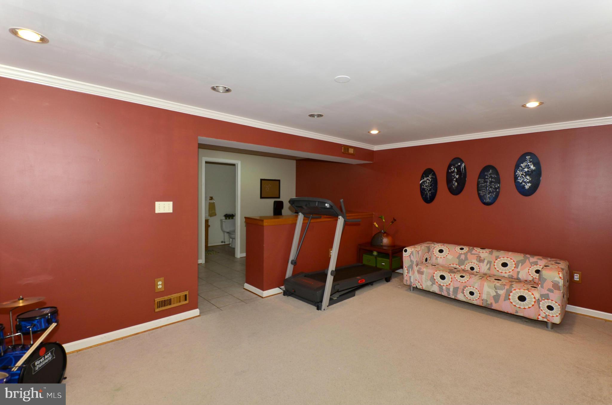 4462 Silver Teal Road Baltimore, MD 21236 - Photo 25 of 30 a view of an empty room with furniture and closet