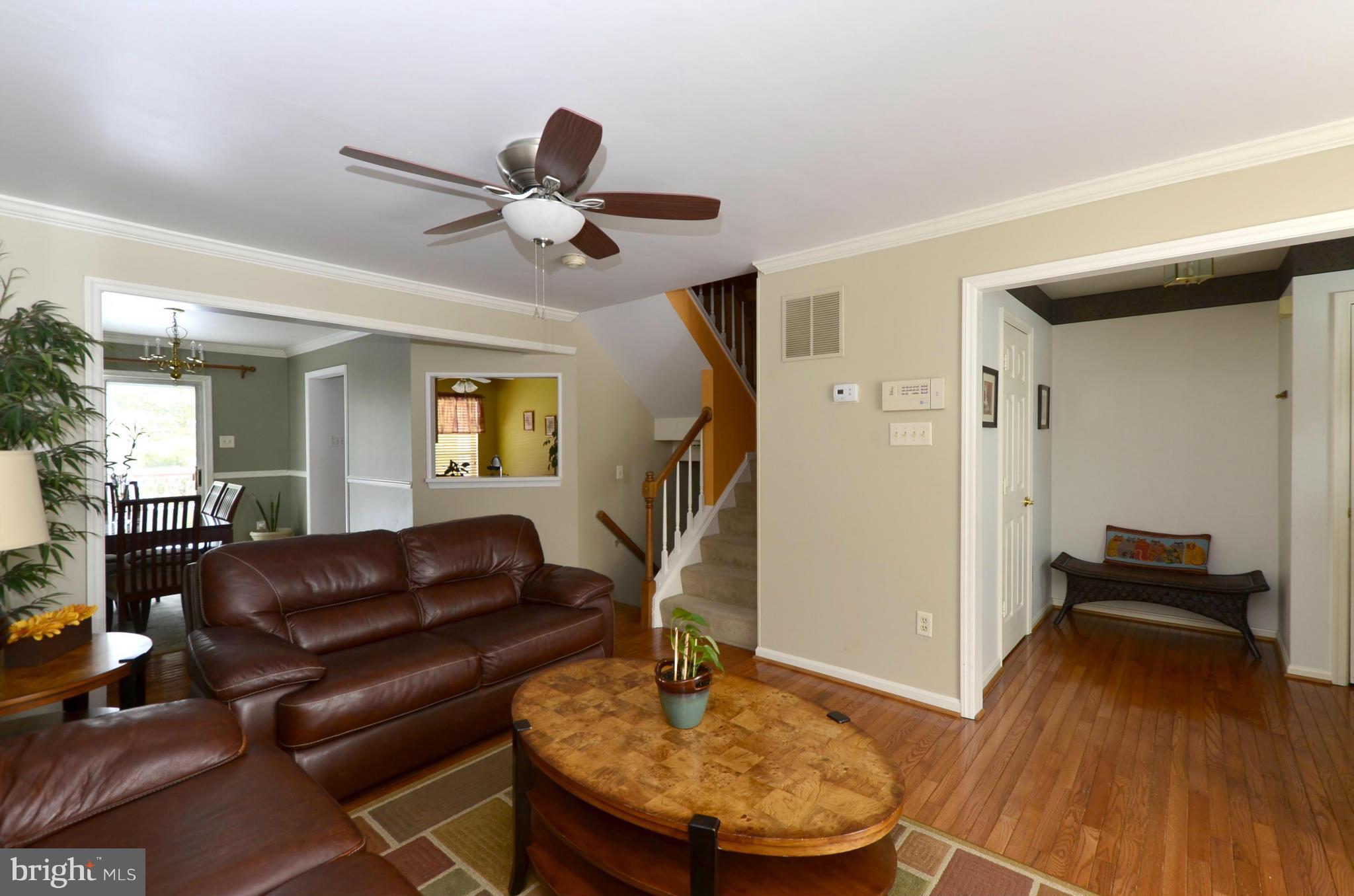 4462 Silver Teal Road Baltimore, MD 21236 - Photo 5 of 30 a living room with furniture and a wooden floor