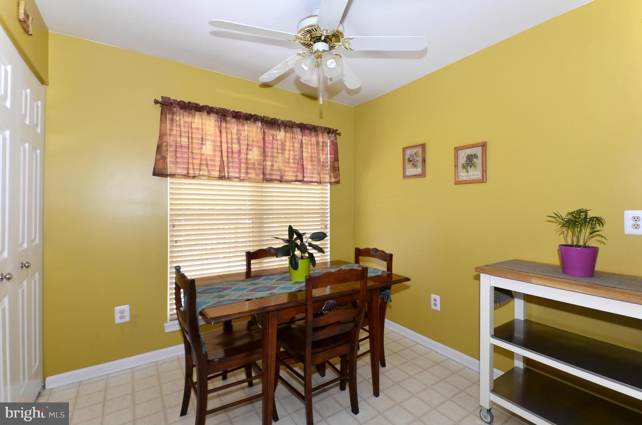 4462 Silver Teal Road Baltimore, MD 21236 - Photo 7 of 30 a dining room with furniture and window