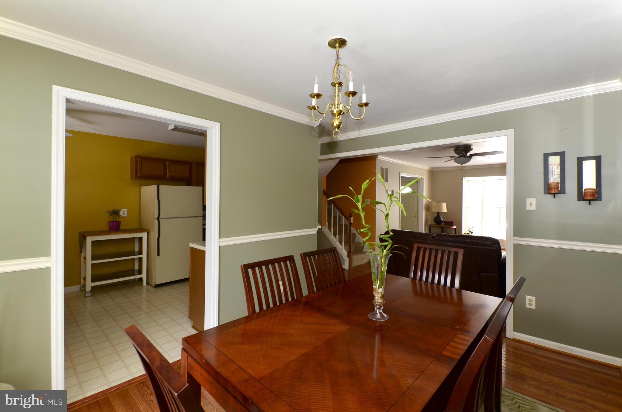 4462 Silver Teal Road Baltimore, MD 21236 - Photo 9 of 30 a view of a dining room with furniture