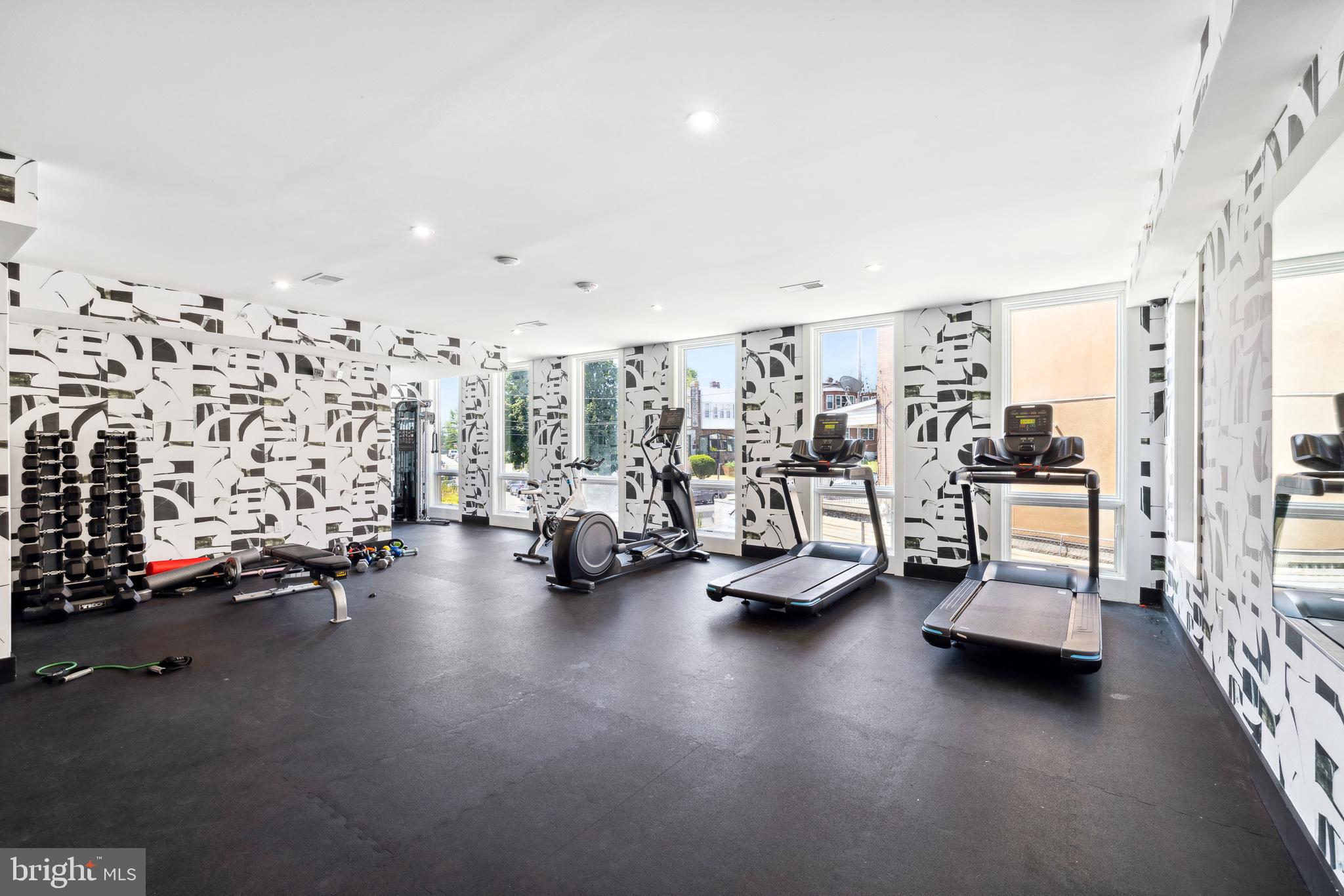 5013 Springfield Avenue, Unit 408 Philadelphia, PA 19143 - Photo 12 of 15 a view of a room with gym equipment