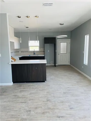 a view of kitchen and window