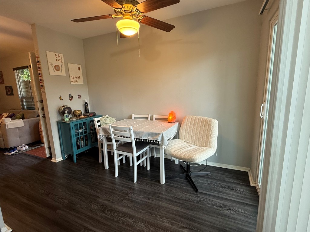 816 Ramble Lane, Unit B Austin, TX 78745 - Photo 22 of 27 a view of a dining room with furniture and wooden floor