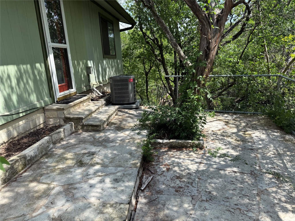 816 Ramble Lane, Unit B Austin, TX 78745 - Photo 25 of 27 a backyard of a house with lots of green space