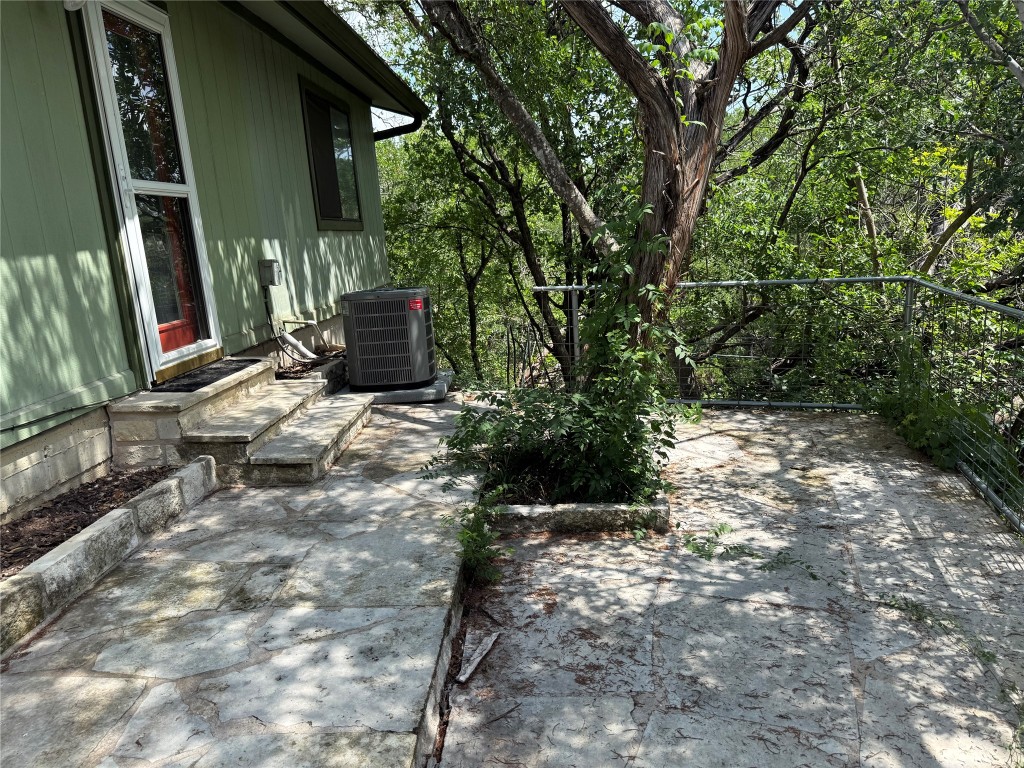 816 Ramble Lane, Unit B Austin, TX 78745 - Photo 26 of 27 a backyard of a house with lots of green space