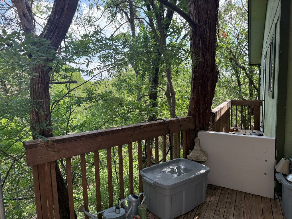 816 Ramble Lane, Unit B Austin, TX 78745 - Photo 8 of 27 a view of a patio with a table chairs and a backyard
