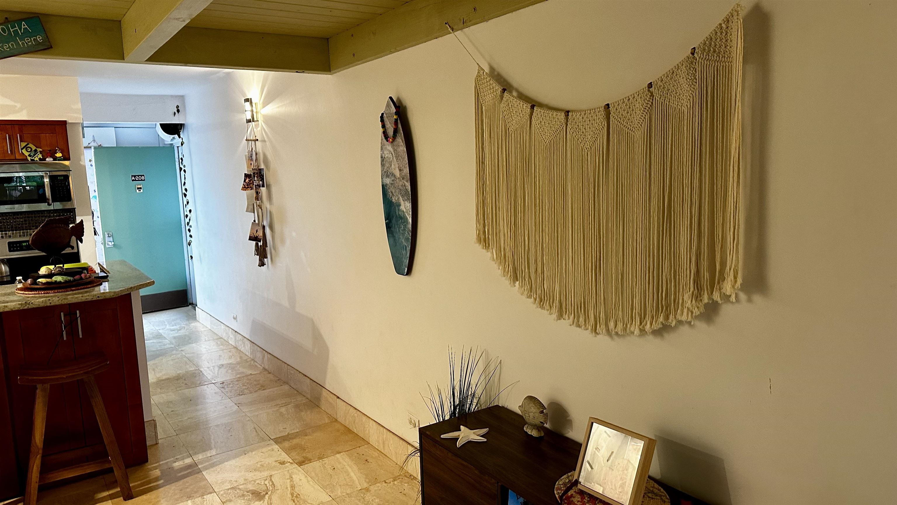 3788 Lower Honoapiilani Road, Unit A208 Lahaina, HI 96761 - Photo 11 of 23 a view of walk in closet with clothes