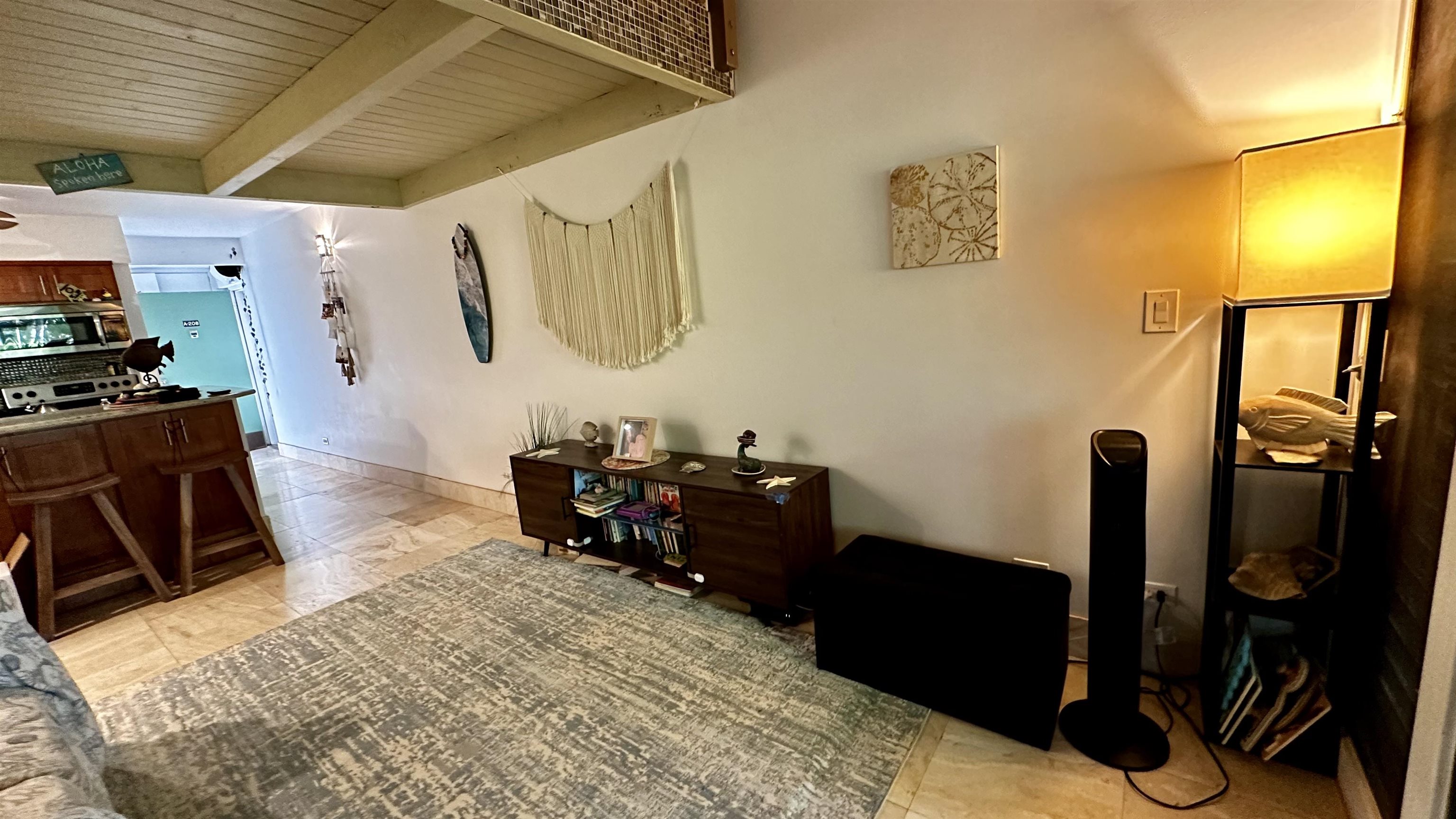 3788 Lower Honoapiilani Road, Unit A208 Lahaina, HI 96761 - Photo 13 of 23 a living room with furniture