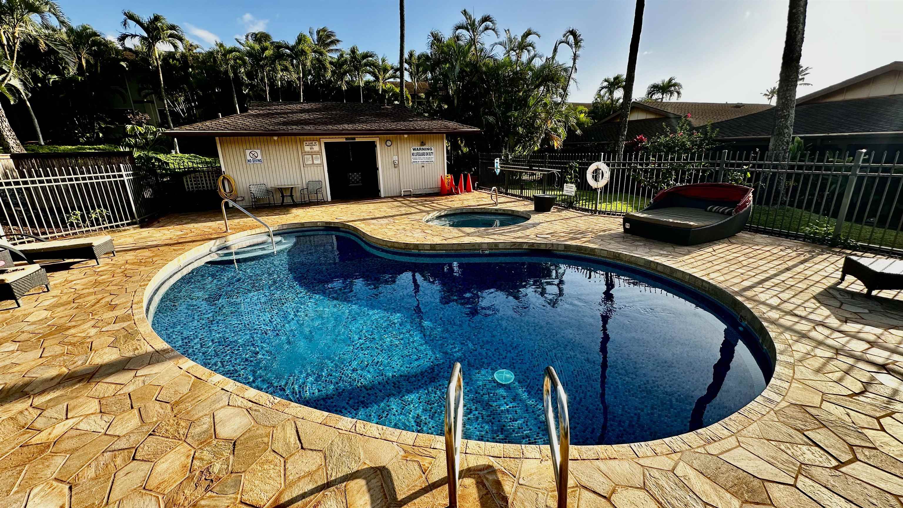 3788 Lower Honoapiilani Road, Unit A208 Lahaina, HI 96761 - Photo 17 of 23 a view of a swimming pool with a patio