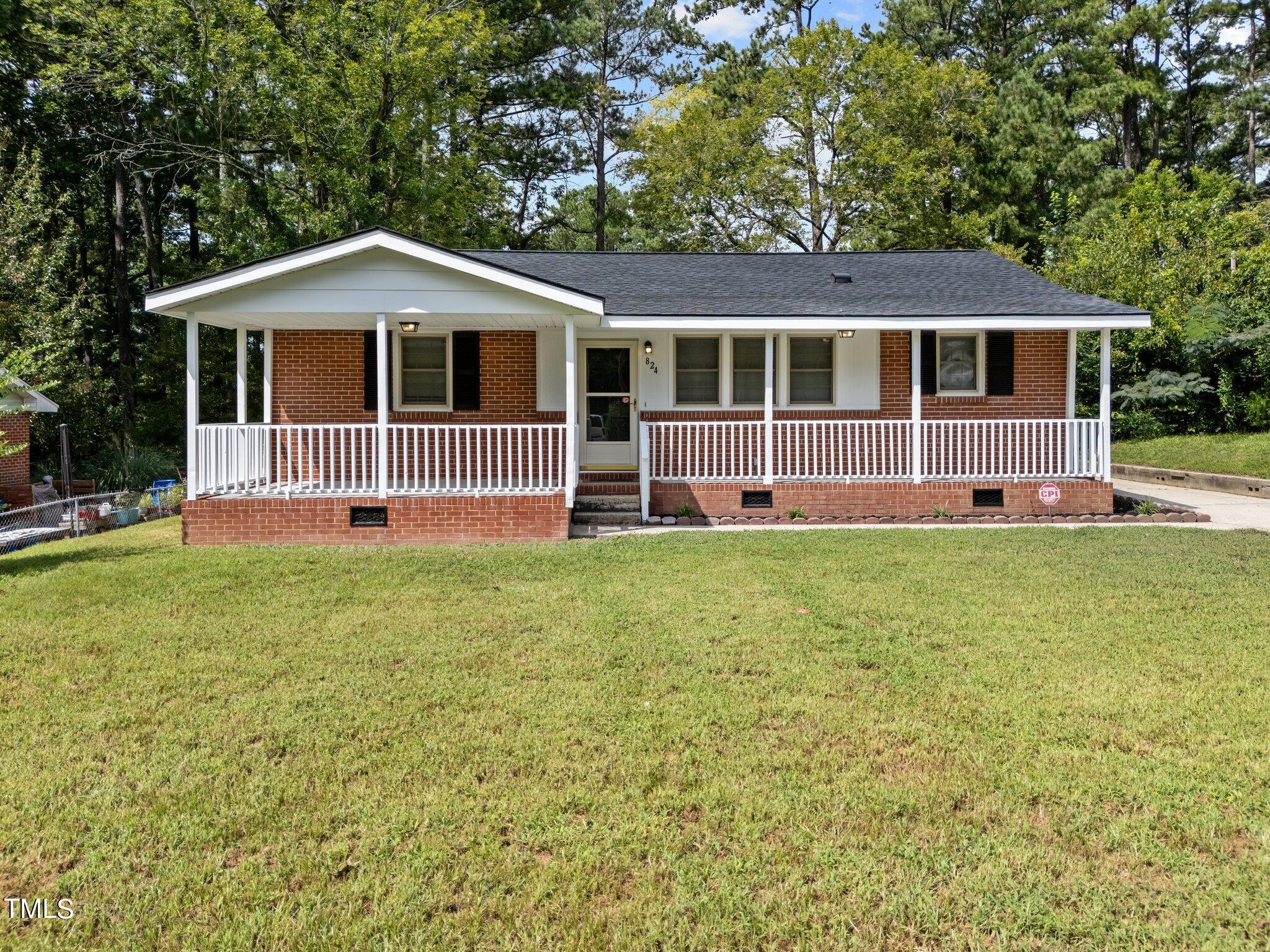 824 Brigham Road Raleigh, NC 27610 - Photo 1 of 18 1-web-or-mls-DJI_20240820113430_0105_D