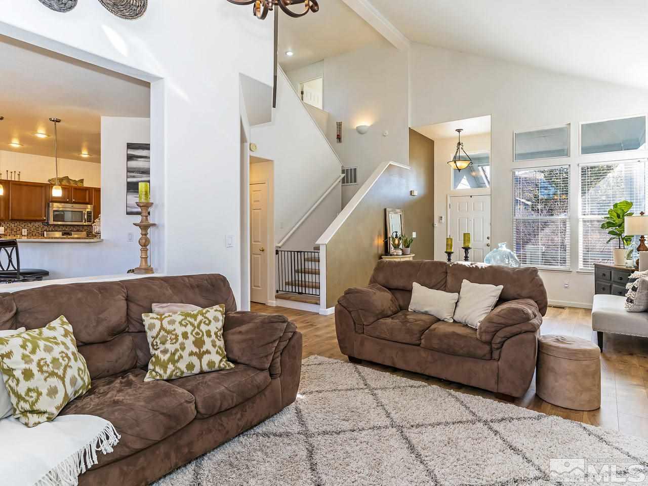 855 Caughlin Crossing Reno, NV 89519 - Photo 8 of 25 a living room with furniture and wooden floor