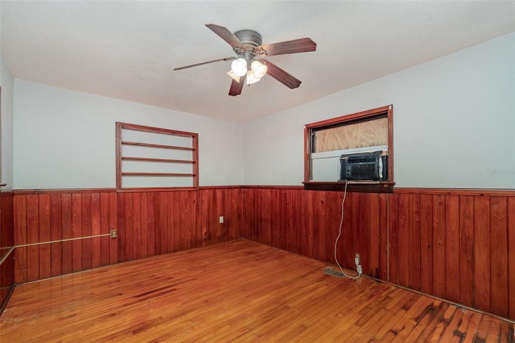 2729 Broadway Fort Myers, FL 33901 - Photo 16 of 49 a view of empty room with wooden floor
