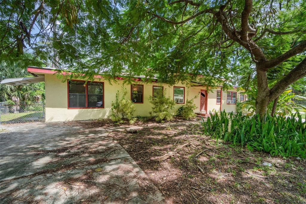 2729 Broadway Fort Myers, FL 33901 - Photo 2 of 49 front view of a house with a yard
