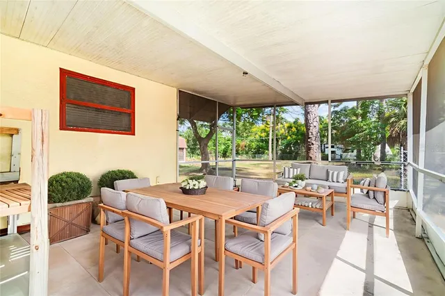 a view of a room with a large window