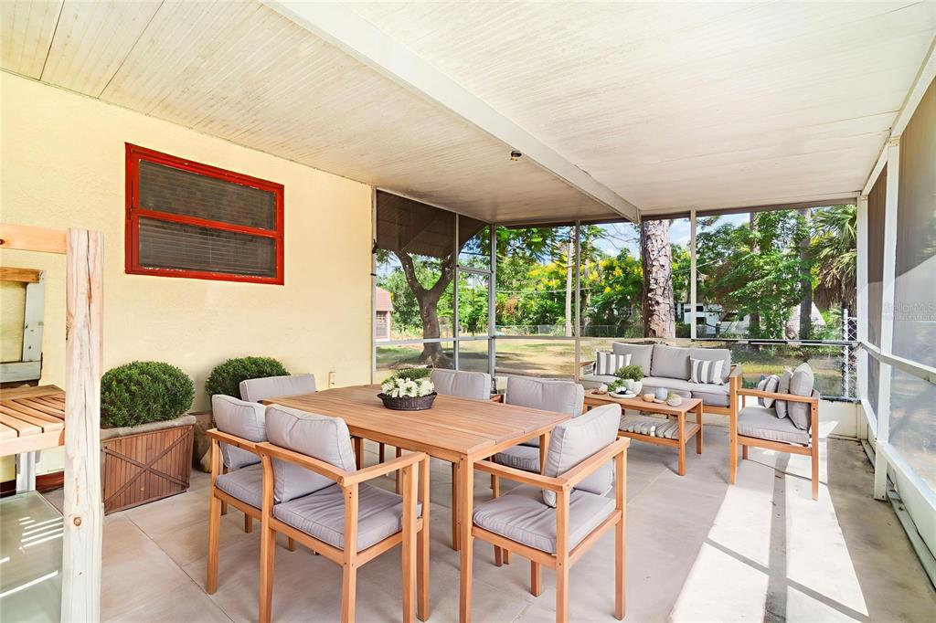 2729 Broadway Fort Myers, FL 33901 - Photo 36 of 49 a dining room with furniture and a large window
