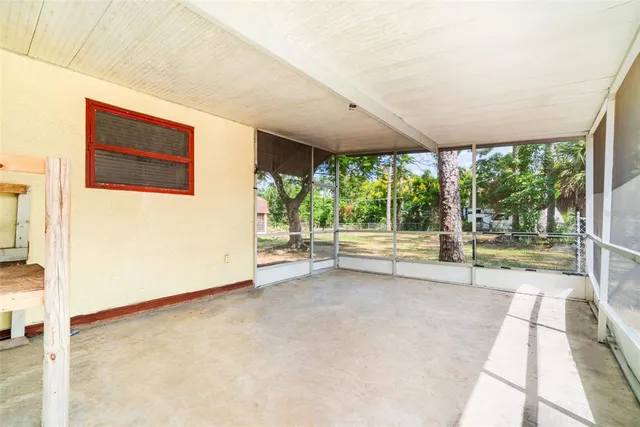 an empty room with sliding door