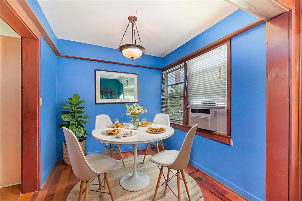 2729 Broadway Fort Myers, FL 33901 - Photo 7 of 49 a view of a dining room with furniture window and wooden floor