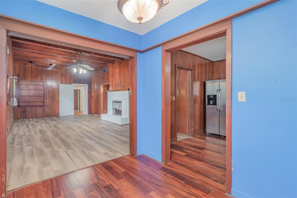 2729 Broadway Fort Myers, FL 33901 - Photo 9 of 49 a view of a hallway with wooden floor and staircase