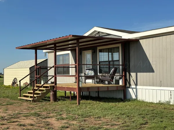 a house view with a outdoor space