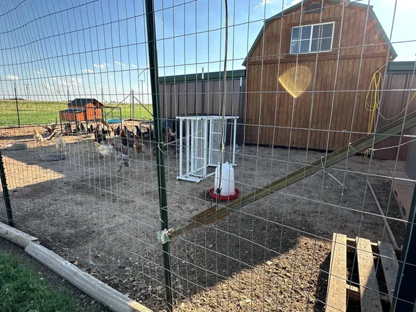 a view of a field with an outdoor space