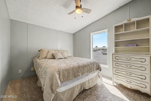 a bedroom with a bed and closet
