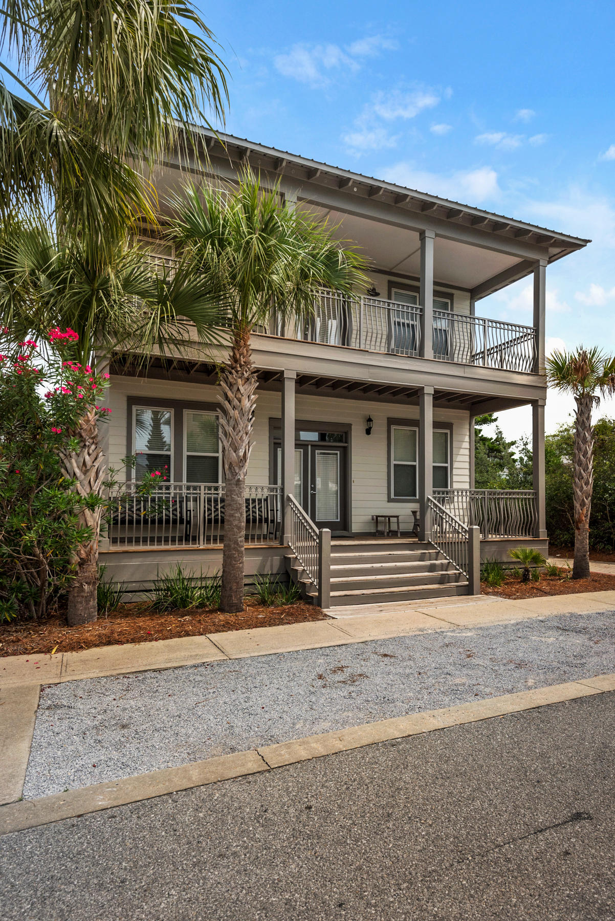 41 East Blue Crab Loop Inlet Beach, FL 32461 - Photo 2 of 63 a front view of a house with a yard