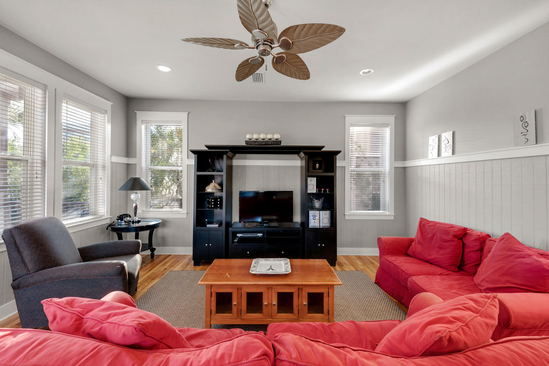 41 East Blue Crab Loop Inlet Beach, FL 32461 - Photo 14 of 63 a living room with furniture a fireplace and a flat screen tv