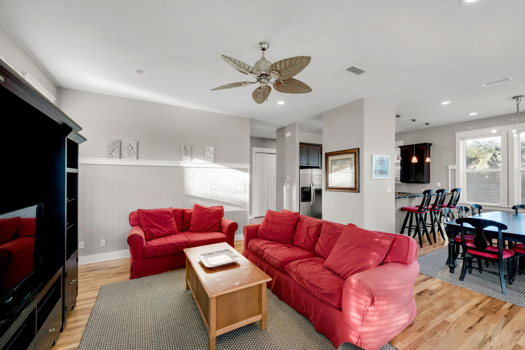 41 East Blue Crab Loop Inlet Beach, FL 32461 - Photo 15 of 63 a living room with furniture kitchen view and a flat screen tv