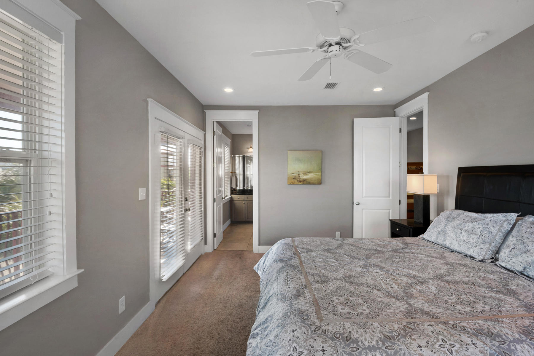 41 East Blue Crab Loop Inlet Beach, FL 32461 - Photo 43 of 63 a bedroom with a large bed and a chandelier