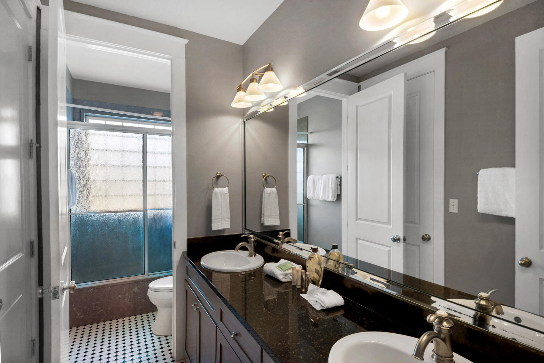 41 East Blue Crab Loop Inlet Beach, FL 32461 - Photo 47 of 63 a bathroom with a granite countertop sink a mirror and a toilet