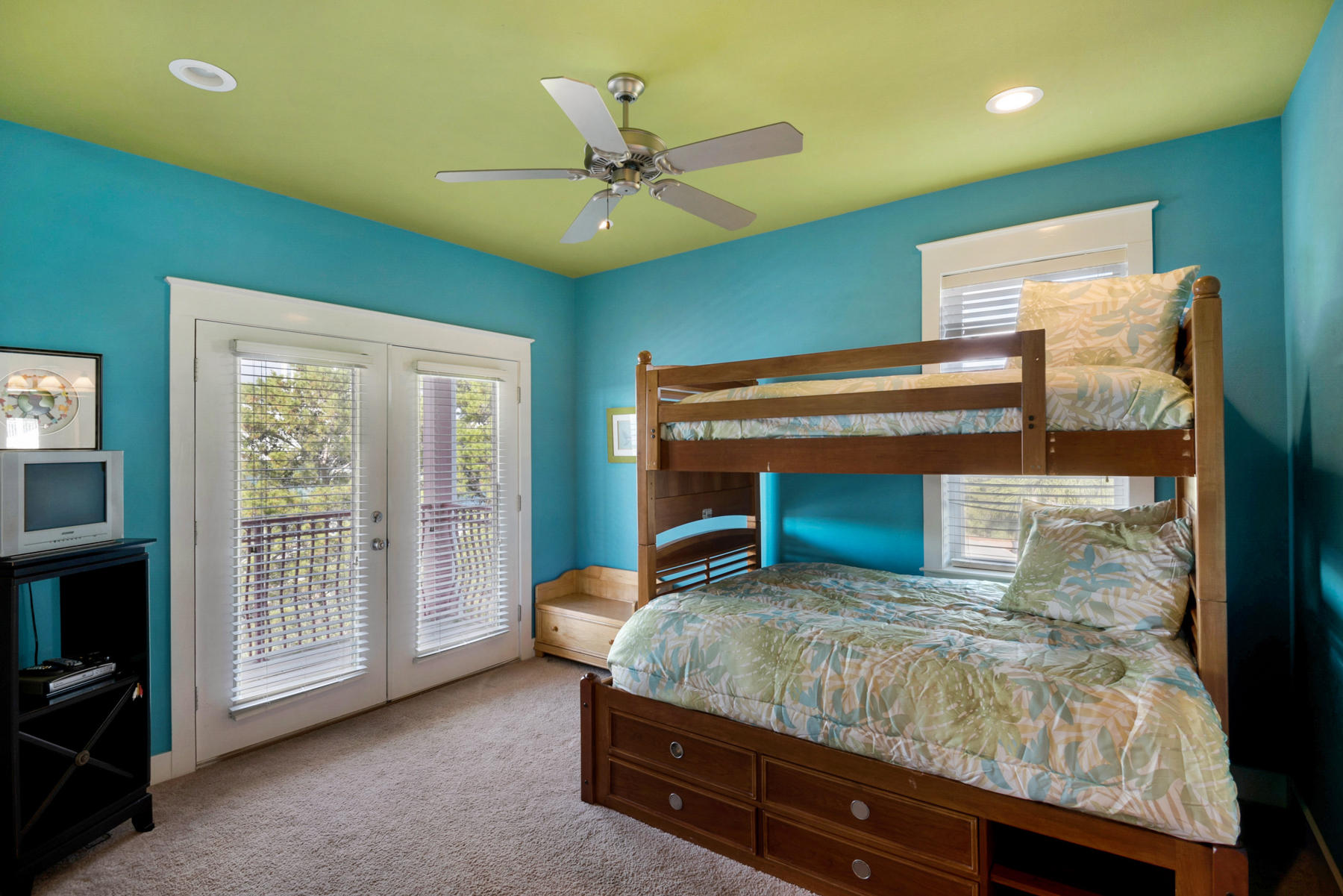 41 East Blue Crab Loop Inlet Beach, FL 32461 - Photo 53 of 63 a bedroom with a bed and a ceiling fan
