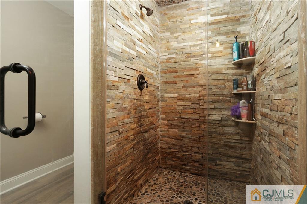 556 Ridge Road Monmouth Junction, NJ 08852 - Photo 15 of 19 a bathroom with a shower