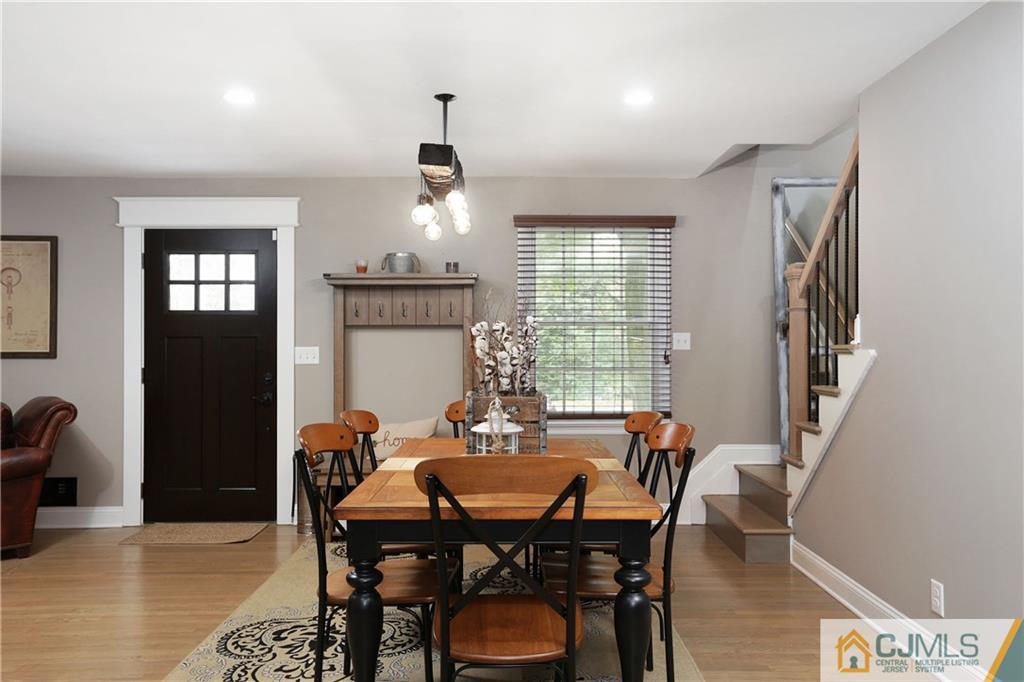 556 Ridge Road Monmouth Junction, NJ 08852 - Photo 5 of 19 a view of a dining room with furniture window and wooden floor