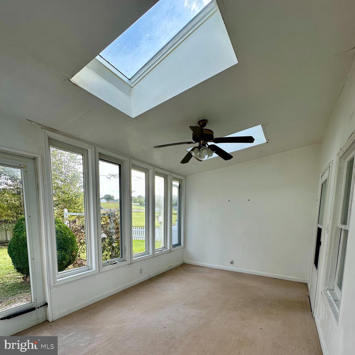 14065 South Middle Road Edinburg, VA 22824 - Photo 4 of 5 a view of an empty room with a window