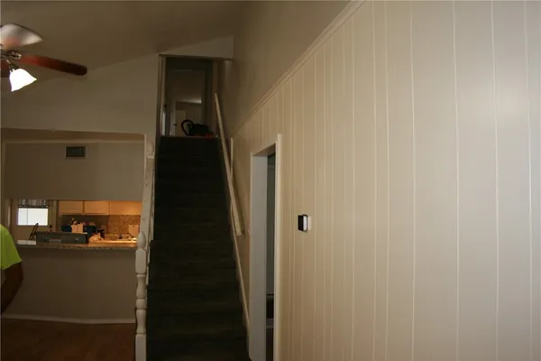 a view of hallway with stairs