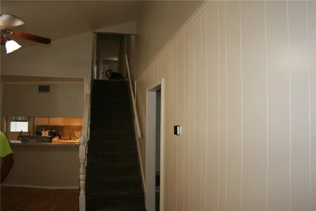 a view of hallway with stairs