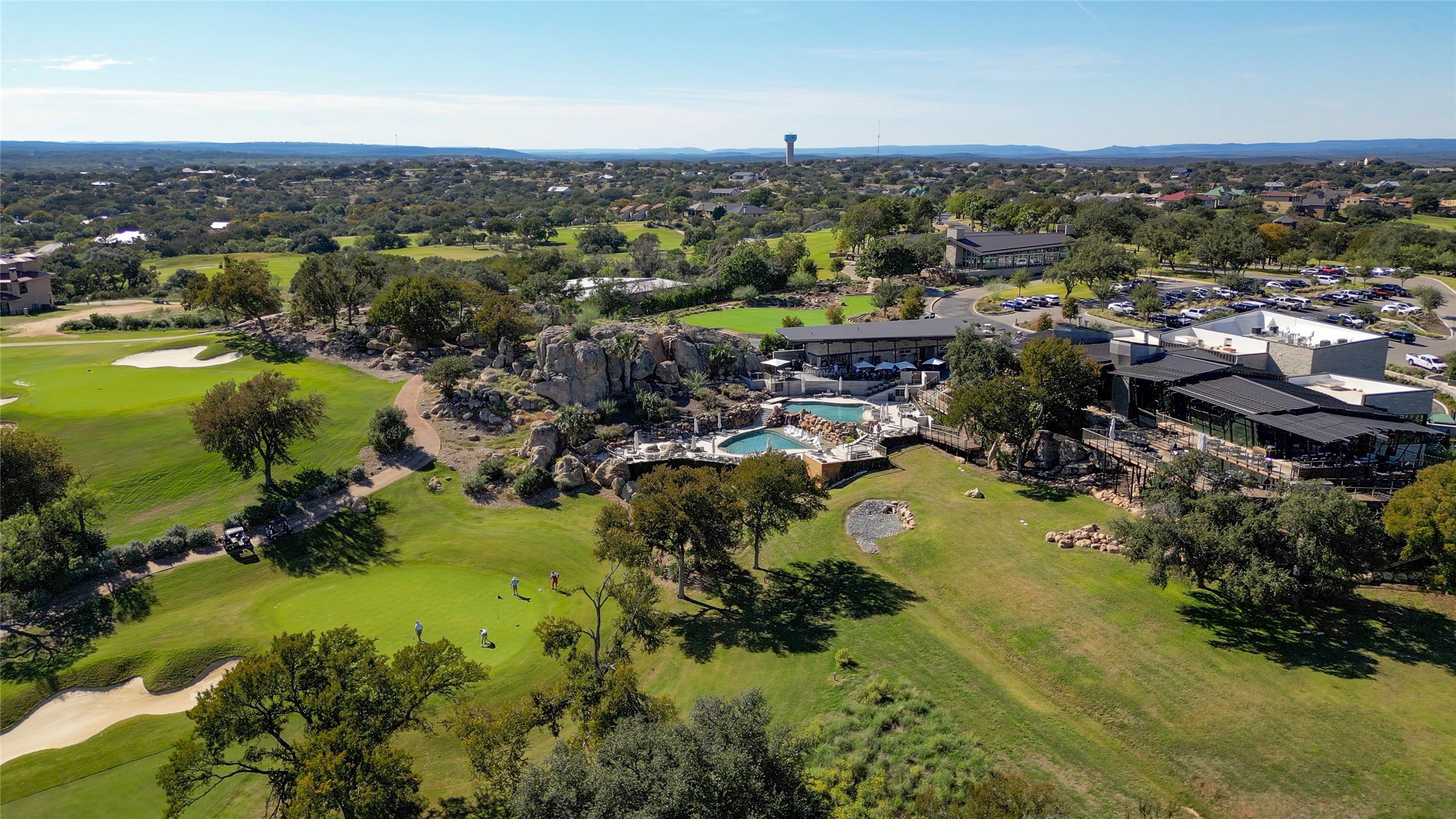 8002 Lachite Drive Horseshoe Bay, TX 78657 - Photo 16 of 33 Aerial view of a pool and Cap Rock Club House