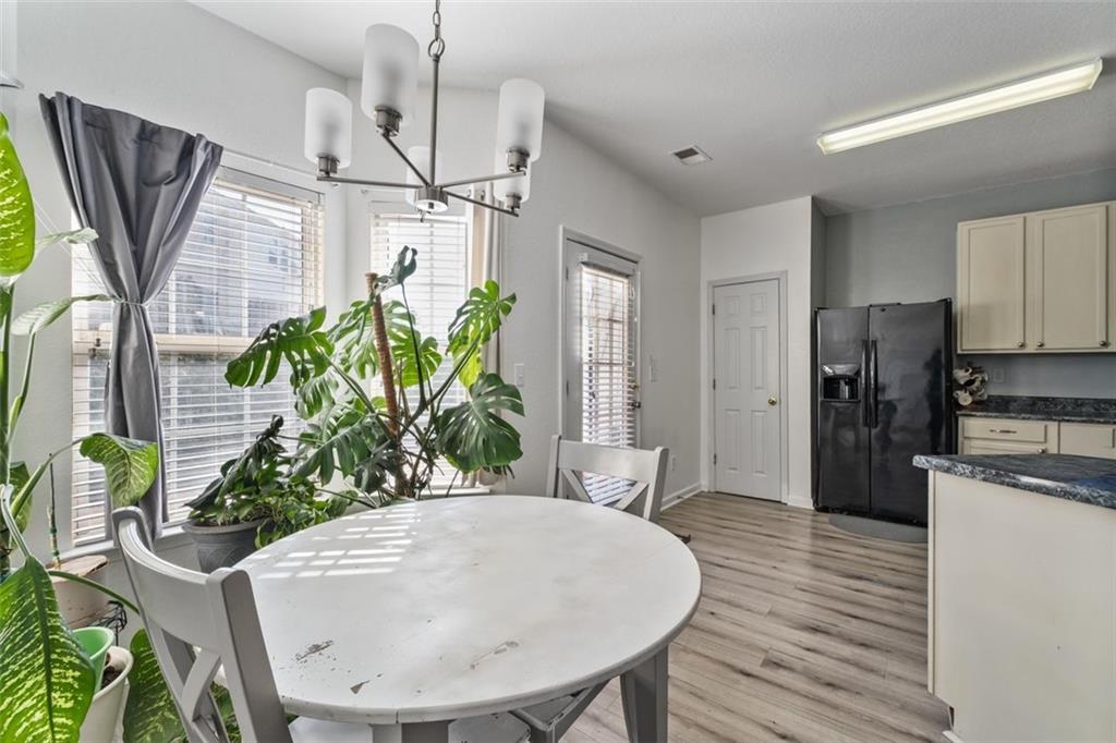 2744 Snapfinger Manor Decatur, GA 30035 - Photo 12 of 29 a view of kitchen with furniture and a potted plant