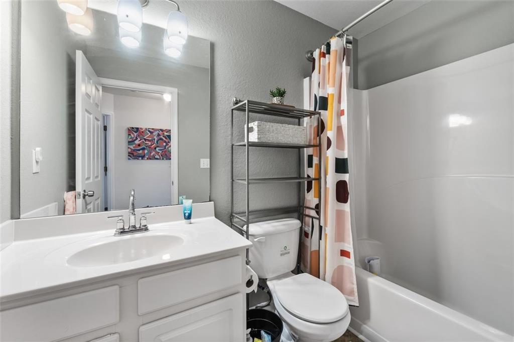 2744 Snapfinger Manor Decatur, GA 30035 - Photo 23 of 29 a bathroom with a sink toilet and shower